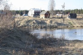 Tuuloksenjoen maantiesillan paikka Aunus