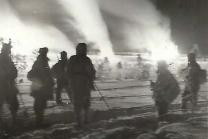 Mai Guba_01 Mai Guban asemaseutu liekeissä_Kuva T Narva 20-1-1942